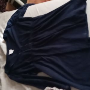 Clothing.Both r size XL The first pic is a dark blue shirt.2nd drk gry size XL